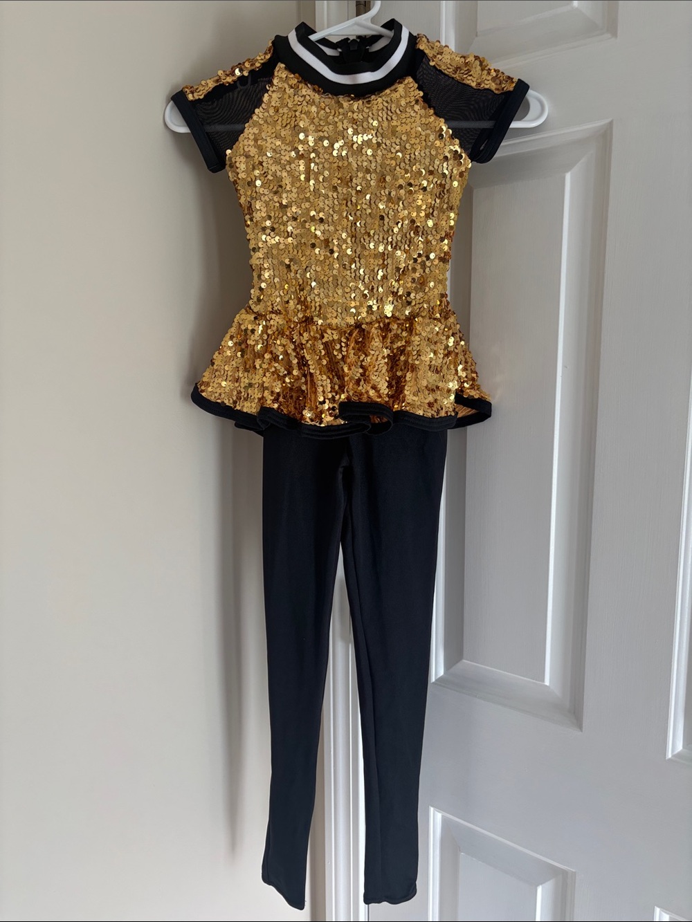 Weissman Gold Sequin Peplum Top with Black Leggings